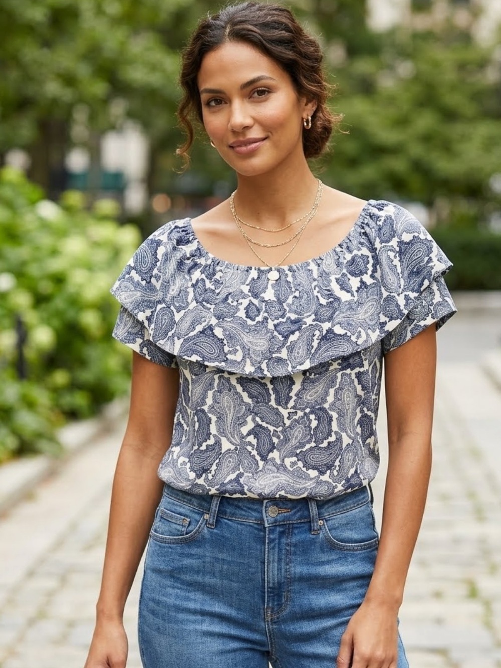 Roz & Ali blouse featuring a classic navy and white paisley pattern